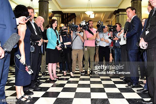 Media gather to speak to Prime Minister John Key and other ministers on December 6, 2016 in Wellington, New Zealand. Prime Minister John Key...