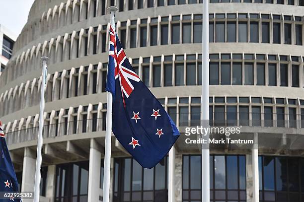 Flags outside Parliament on December 6, 2016 in Wellington, New Zealand. Prime Minister John Key announced his surprise resignation as Prime Minister...