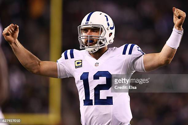 Andrew Luck of the Indianapolis Colts celebrates a touchdown in the fourth quarter against the New York Jets during their game at MetLife Stadium on...