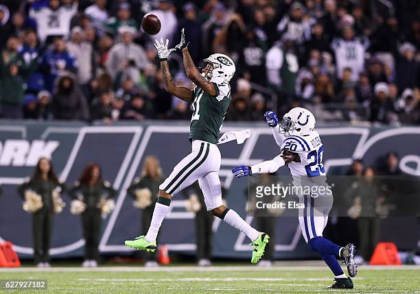 Robby Anderson of the New York Jets fails to complete a pass as Darius Butler of the Indianapolis Colts defends in the third quarter during their...