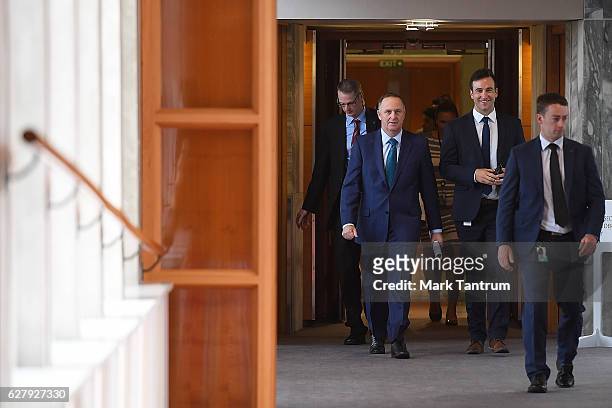 Prime Minister John Key approaches Parliament on December 6, 2016 in Wellington, New Zealand. Prime Minister John Key announced his surprise...