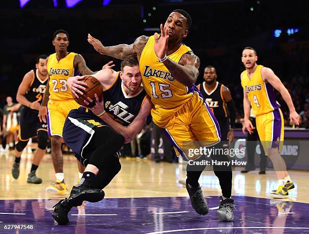 Gordon Hayward of the Utah Jazz drives to the basket on Thomas Robinson of the Los Angeles Lakers during the second half of a 107-101 Jazz win at...