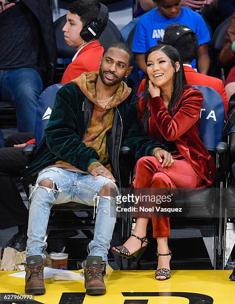 Big Sean and Jhene Aiko attend a basketball game between Utah Jazz and the Los Angeles Lakers at Staples Center on December 5, 2016 in Los Angeles,...