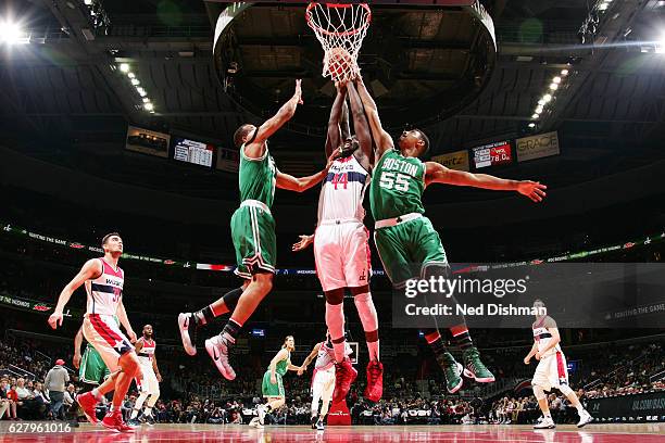 Andrew Nicholson of the Washington Wizards goes for the rebound during the game against Jordan Mickey of the Boston Celtics on November 9, 2016 at...