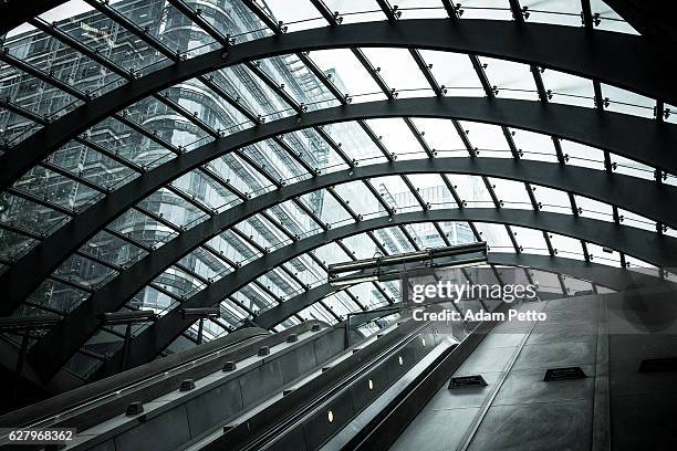 futuristic architecture at canary wharf, city of london, uk - ominous stock pictures, royalty-free photos & images