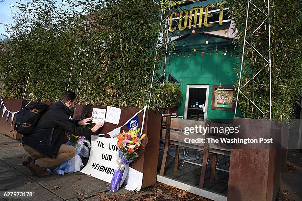 Jared Peterson leaves a sign outside Comet Ping Pong on Monday Decmmber 05, 2016 in Washington, DC. A man identified as Edgar Maddison Welch was...