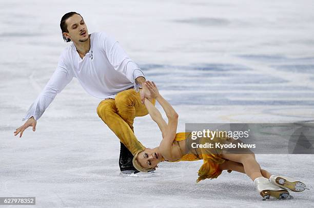 Russia - Russia's Tatiana Volosozhar and Maxim Trankov perform during the pairs free program of the Winter Olympics figure skating event at the...