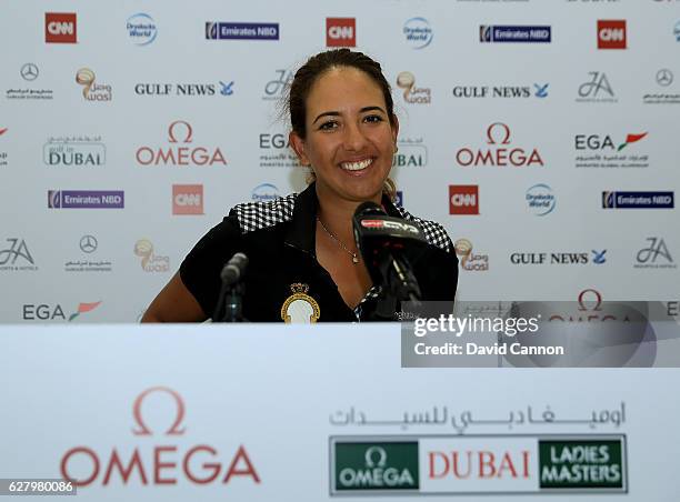 Maha Haddioui of Morocco speaks tp the media in her press conference during the pro-am as a preview for the 2016 Omega Dubai Ladies Masters on the...