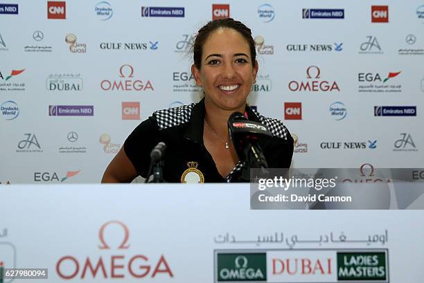 Maha Haddioui of Morocco speaks tp the media in her press conference during the pro-am as a preview for the 2016 Omega Dubai Ladies Masters on the...