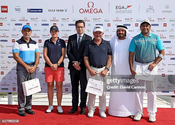 Gwladys Nocera-Pucet of France with her second place team in the morning pro-am competition during the pro-am as a preview for the 2016 Omega Dubai...