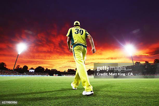 Pat Cummins of Australia fields on the boundary during game two of the One Day International series between Australia and New Zealand at Manuka Oval...