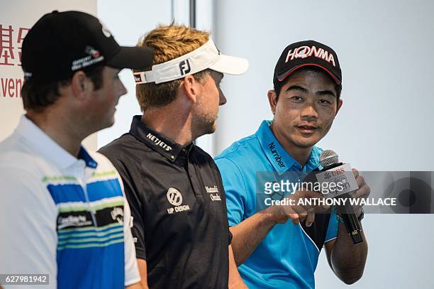 Golfer Liang Wenchong of China speaks as Patrick Reed of the US and Ian Poulter of Britain listen during a press conference in Hong Kong on December...