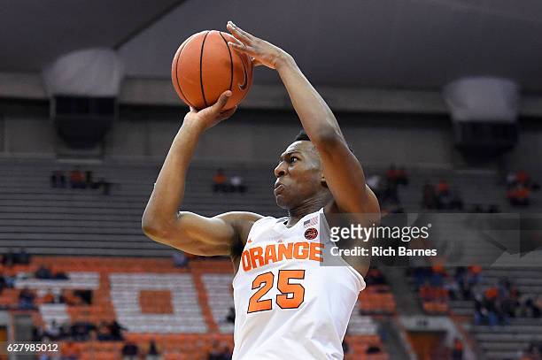 Tyus Battle of the Syracuse Orange shoots the ball against the North Florida Ospreys during the second half at the Carrier Dome on December, 3 2016...