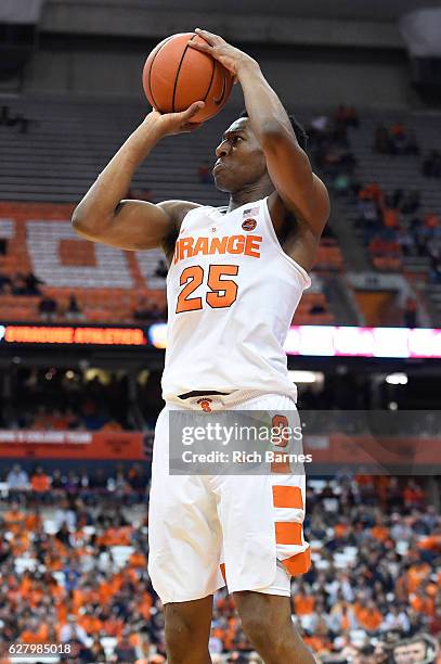 Tyus Battle of the Syracuse Orange shoots the ball against the North Florida Ospreys during the second half at the Carrier Dome on December, 3 2016...