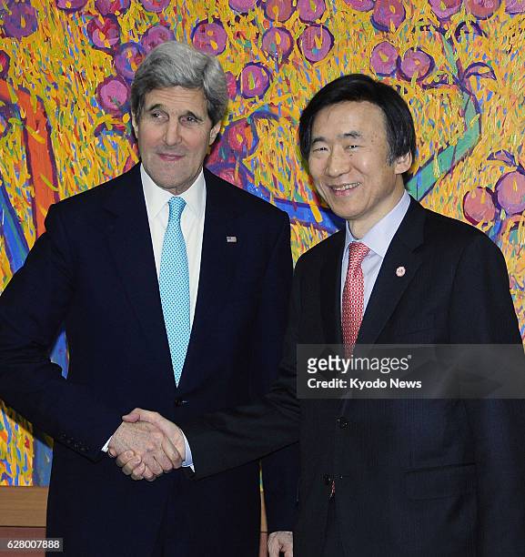 South Korea - U.S. Secretary of State John Kerry and South Korean Foreign Minister Yun Byung Se shake hands before their talks in Seoul on Feb. 13,...