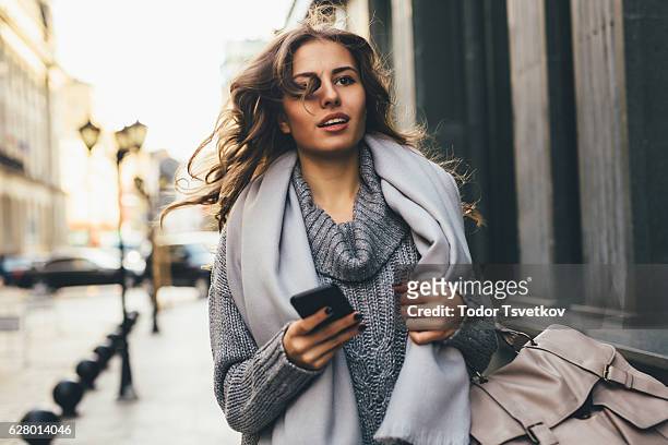 woman rushing down the street - car top down stock pictures, royalty-free photos & images