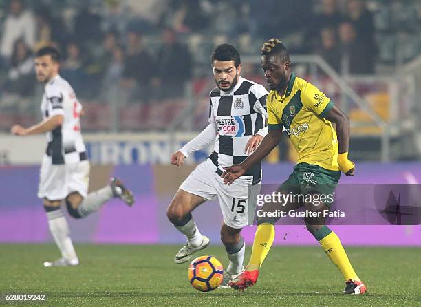 Pacos Ferreira's forward Barnes Osei from Gana with Boavista FC's midfielder Emin Makhmudov in action during the Primeira Liga match between Pacos de...