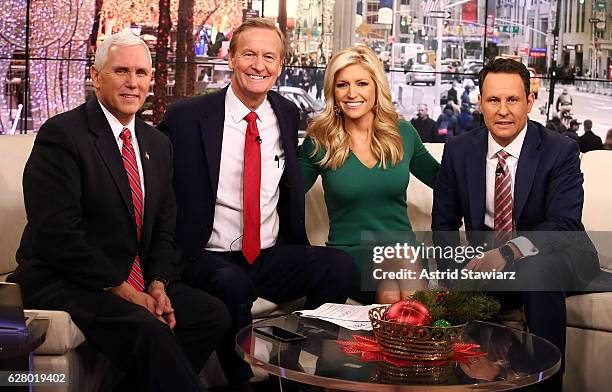 Vice President-Elect Mike Pence poses for photos with "Fox & Friends" hosts, Steve Doocy, Ainsley Earhardt and Brian Kilmeade at Fox News Studios on...