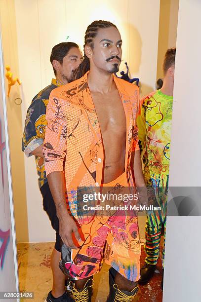 Model walks at the Patricia Field Art Basel Debut with Art Fashion Pop Up and Runway Presentation at The White Dot Gallery in Wynwood on December 1,...