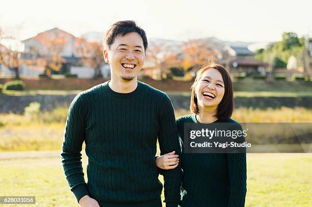 couple having a good time in outdoors - asian married stock pictures, royalty-free photos & images