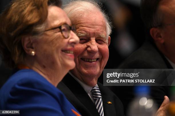 German politician Kurt Biedenkopf and his wife Ingrid Biedenkopf follows a speech during conservative Christian Democratic Union party's congress in...