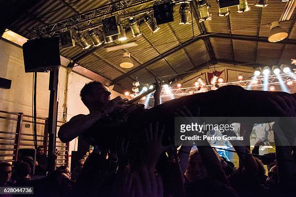 Profundo P of The Anomalys crowdsurfs during their performance at Barreiro Rocks festival on December 3, 2016 in Lisbon, Portugal.