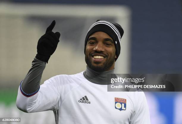 Lyon's French forward Alexandre Lacazette gestures during a training session at the Parc Olympique Lyonnais in Décines-Charpieu near Lyon,...