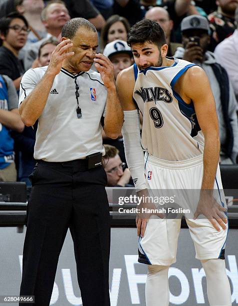 Ricky Rubio of the Minnesota Timberwolves speaks with referee Dan Crawford during the game against the New York Knicks on November 30, 2016 at Target...
