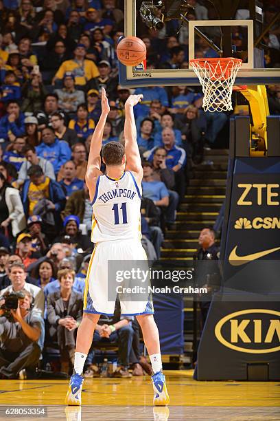 Klay Thompson of the Golden State Warriors shoots a foul shot against the Indiana Pacers on December 5, 2016 at ORACLE Arena in Oakland, California....