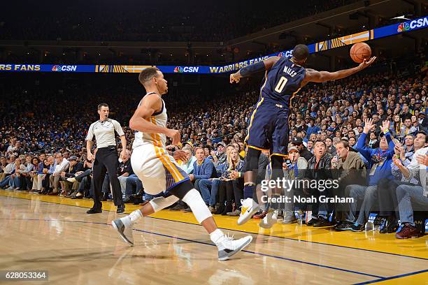 Miles of the Indiana Pacers saves a ball from going out of bounds during the game against the Golden State Warriors on December 5, 2016 at ORACLE...