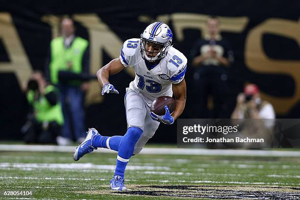 Jones of the Detroit Lions runs with the ball during a game against the New Orleans Saints at the Mercedes-Benz Superdome on December 4, 2016 in New...