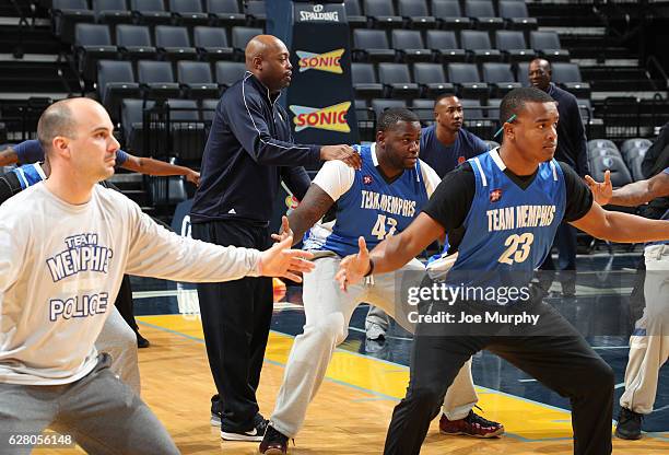 Keith Smart of the Memphis Grizzlies participates in a coaching clinic to tip-off The Memphis Police Athletic/Activities League program on December...