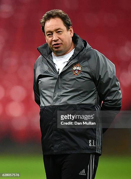 Leonid Slutskiy the head coach of PFC CSKA Moskva watches over his players during the PFC CSKA Moskva training session at Wembley Stadium on December...
