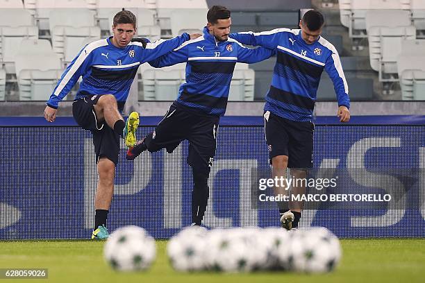 Dinamo's defender Marko Leskovic of Croatia , Dinamo's defender Petar Stojanovic from Slovenia and Dinamo's forward Amer Gojak of Bosnia Erzegovina...