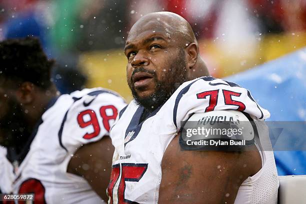 Vince Wilfork of the Houston Texans sits on the sideline in the third quarter against the Green Bay Packers at Lambeau Field on December 4, 2016 in...