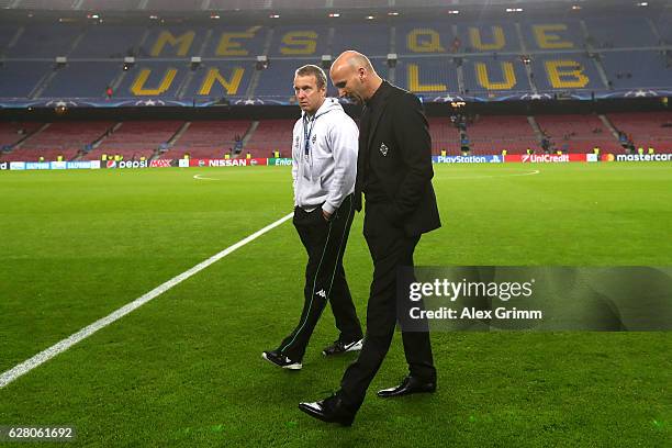 Frank Geideck Assistant coach and Andre Schubert head coach of Borussia Moenchengladbach speak while taking a look around the pitch prior to kick off...