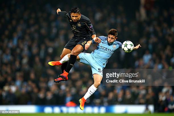 Emilio Izaguirre of Celtic and Pablo Maffeo Becerra of Manchester City both battle to win a header during the UEFA Champions League Group C match...