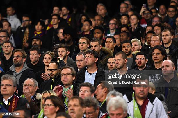 Liverpool players and Jurgen Klopp, Manager of Liverpool are seen in the stands during the UEFA Champions League Group C match between FC Barcelona...