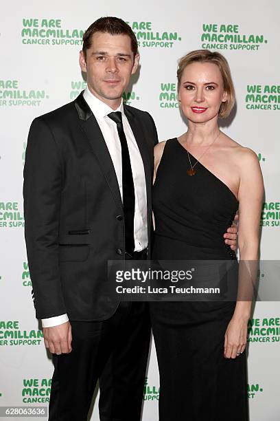 Kenny Doughty and Caroline Carver attend the Macmillan Cancer Support Celebrity Christmas Stocking Auction at Park Lane Hotel on December 6, 2016 in...