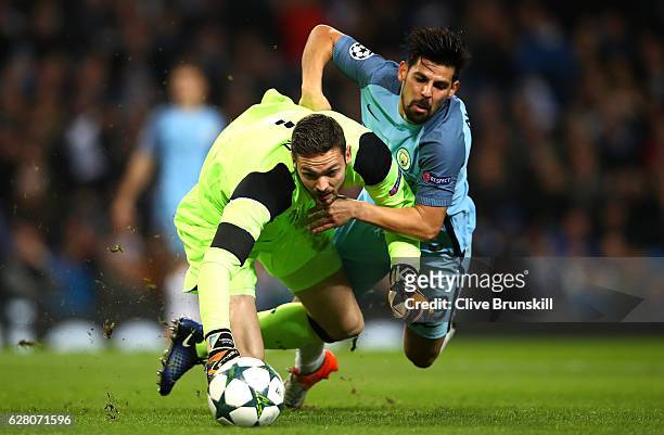 Craig Gordon of Celtic and Nolito of Manchester City both challenge for the ball during the UEFA Champions League Group C match between Manchester...