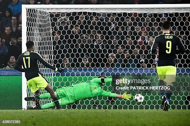 Arsenal's Nigerian forward Alex Iwobi scores a goal during the UEFA Champions league Group A football match between FC Basel 1893 and Arsenal FC on...