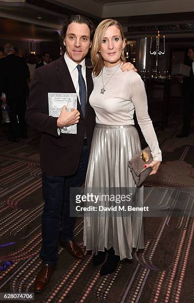 Sacha Newley and Lee Sharrock attend Macmillan Cancer Support's celebrity Christmas stocking auction at The Park Lane Hotel on December 6, 2016 in...
