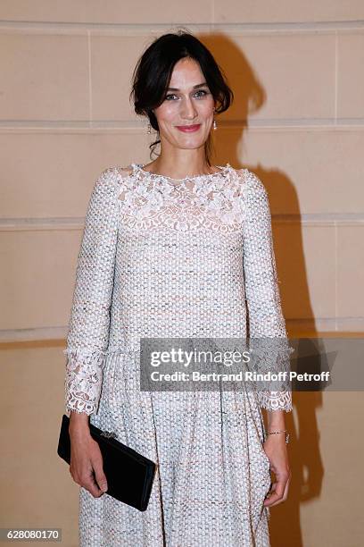 Clotilde Hesme attends the "Chanel Collection des Metiers d'Art 2016/17 : Paris Cosmopolite" : Photocall at Hotel Ritz on December 6, 2016 in Paris,...