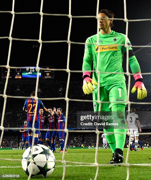 Arda Turan of Barcelona celebrates scoring his sides third goal with his Barcelona team mates during the UEFA Champions League Group C match between...