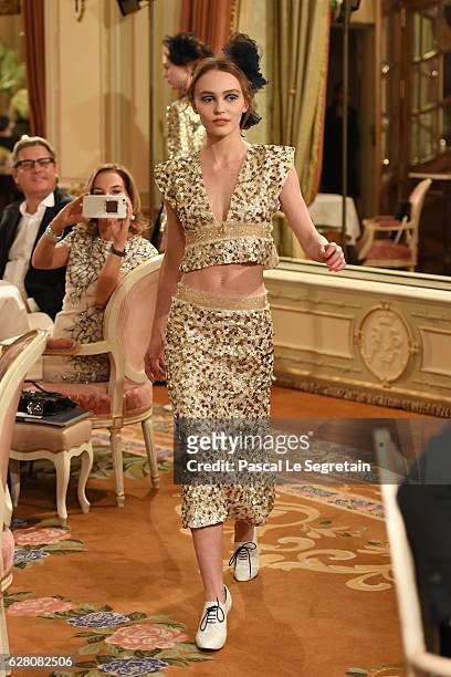 Lily-Rose Depp walks the runway during "Chanel Collection des Metiers d'Art 2016/17 : Paris Cosmopolite" show on December 6, 2016 in Paris, France.