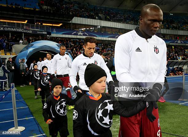 Football players of Besiktas enter to field prior to the UEFA Champions league football match between Dinamo Kiev and Besiktas at the Olimpiyskiy...