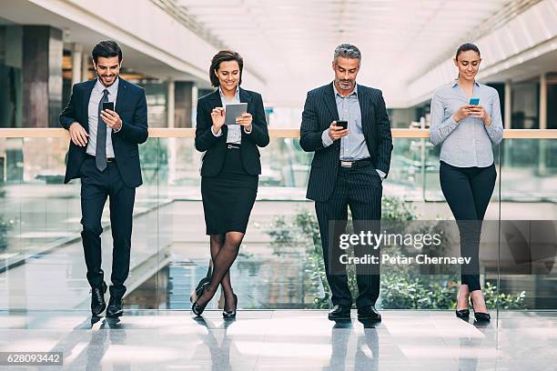 corporate business networking - bussines group suit tie stock pictures, royalty-free photos & images