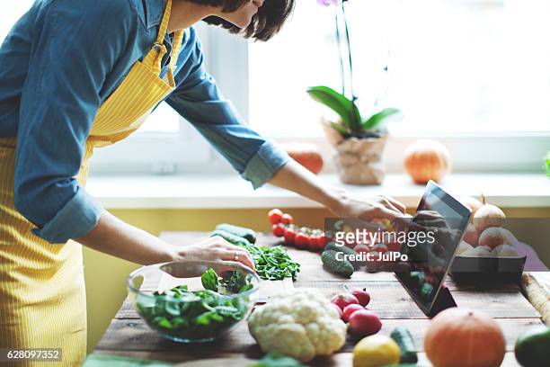 fresh vegetables - cookery books stock pictures, royalty-free photos & images