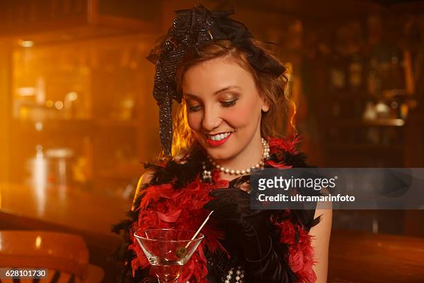 retro bar  old-fashioned  young woman drinking martini - speakeasy interior stock pictures, royalty-free photos & images