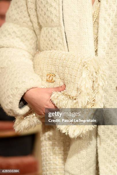 Model,bag detail, walks the runway during "Chanel Collection des Metiers d'Art 2016/17 : Paris Cosmopolite" show on December 6, 2016 in Paris, France.